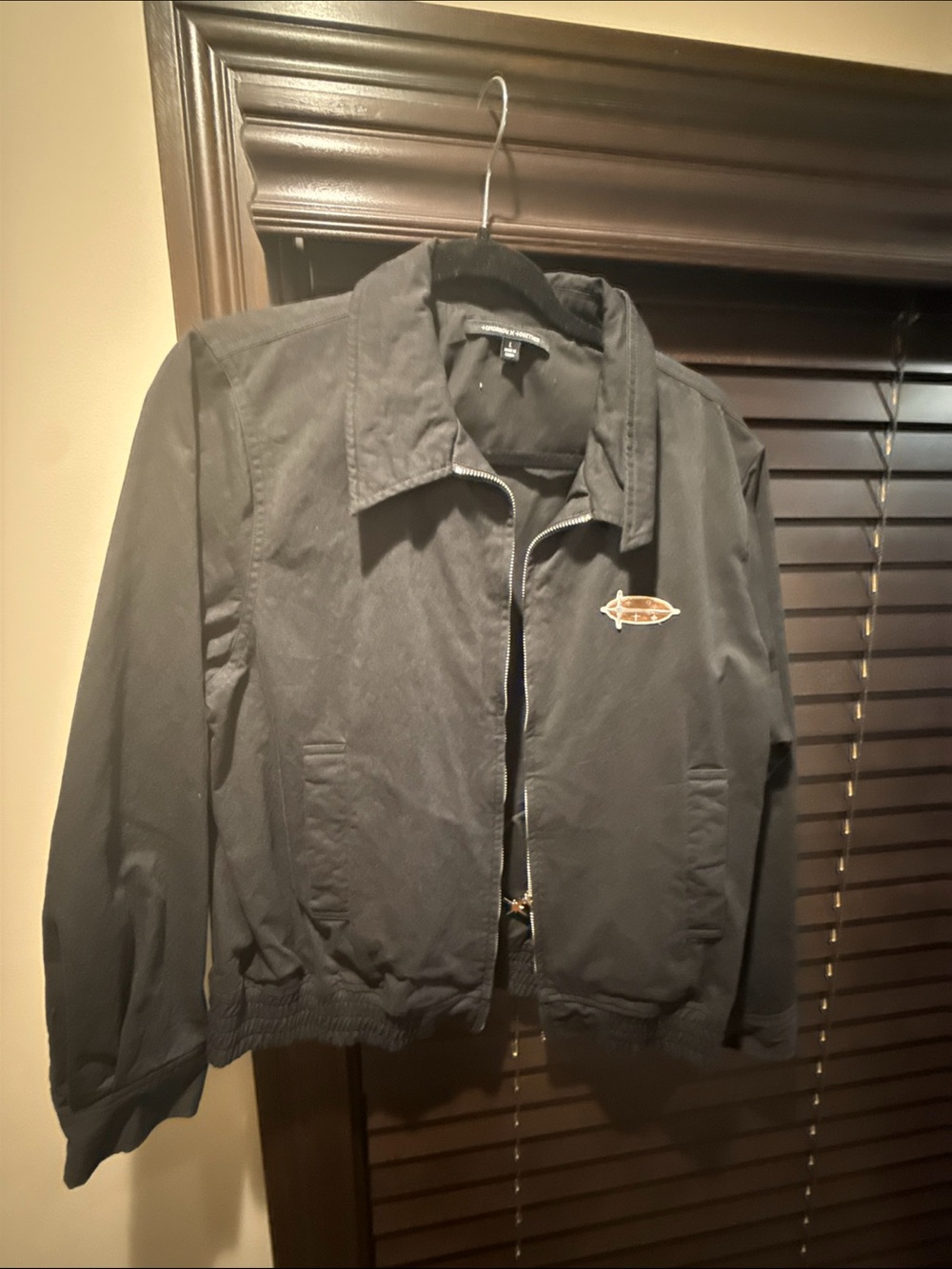 Women’s Black Bomber Jacket with Subtle Chest Embellishment